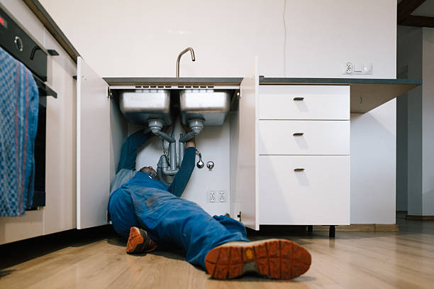 Professional Emergency Plumber technician working in Meally, KY